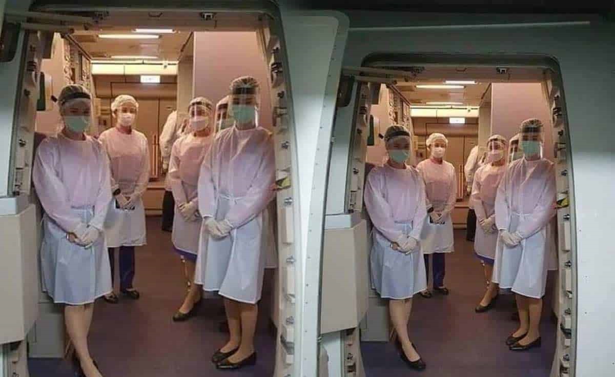 Cabin Crew in PPE Suite to prevent corona